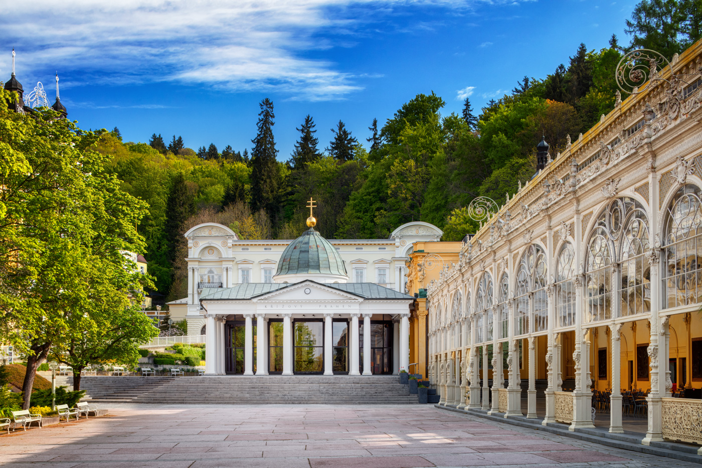 The white Cross Spring pavilion beside the Main Colonnade