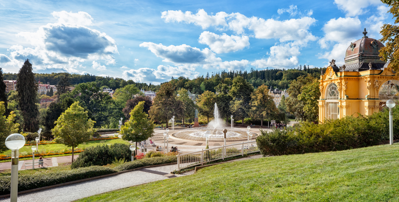 Spa park with manicured paths and flower beds